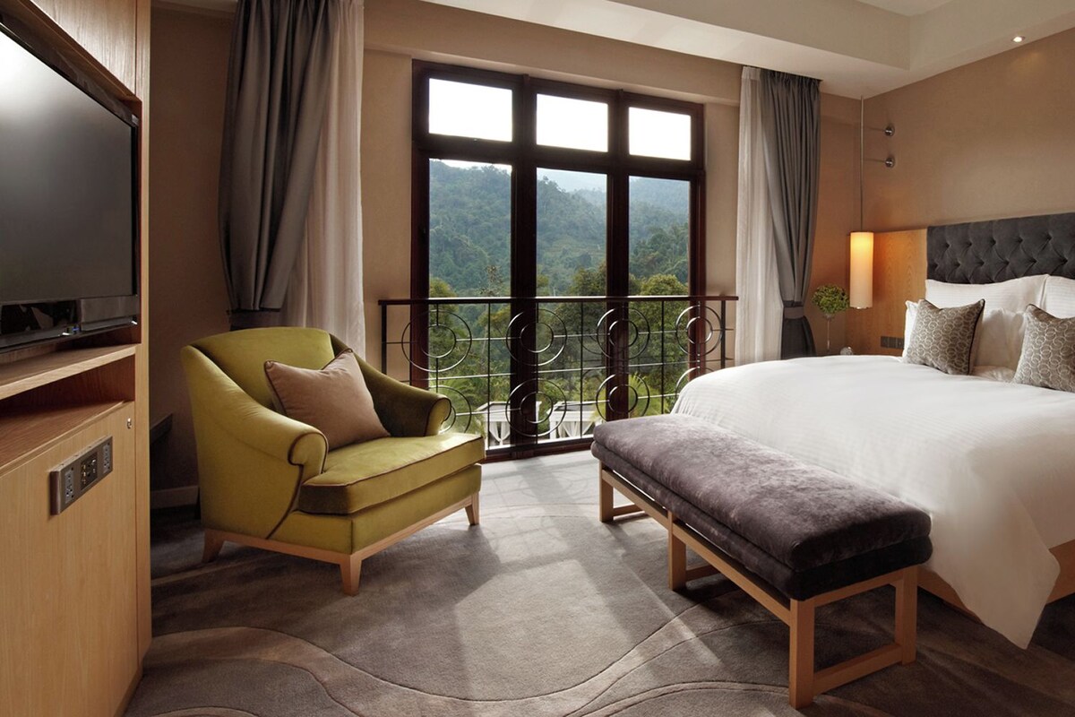 Luxe beddengoed, een minibar, een kluis op de kamer, een bureau