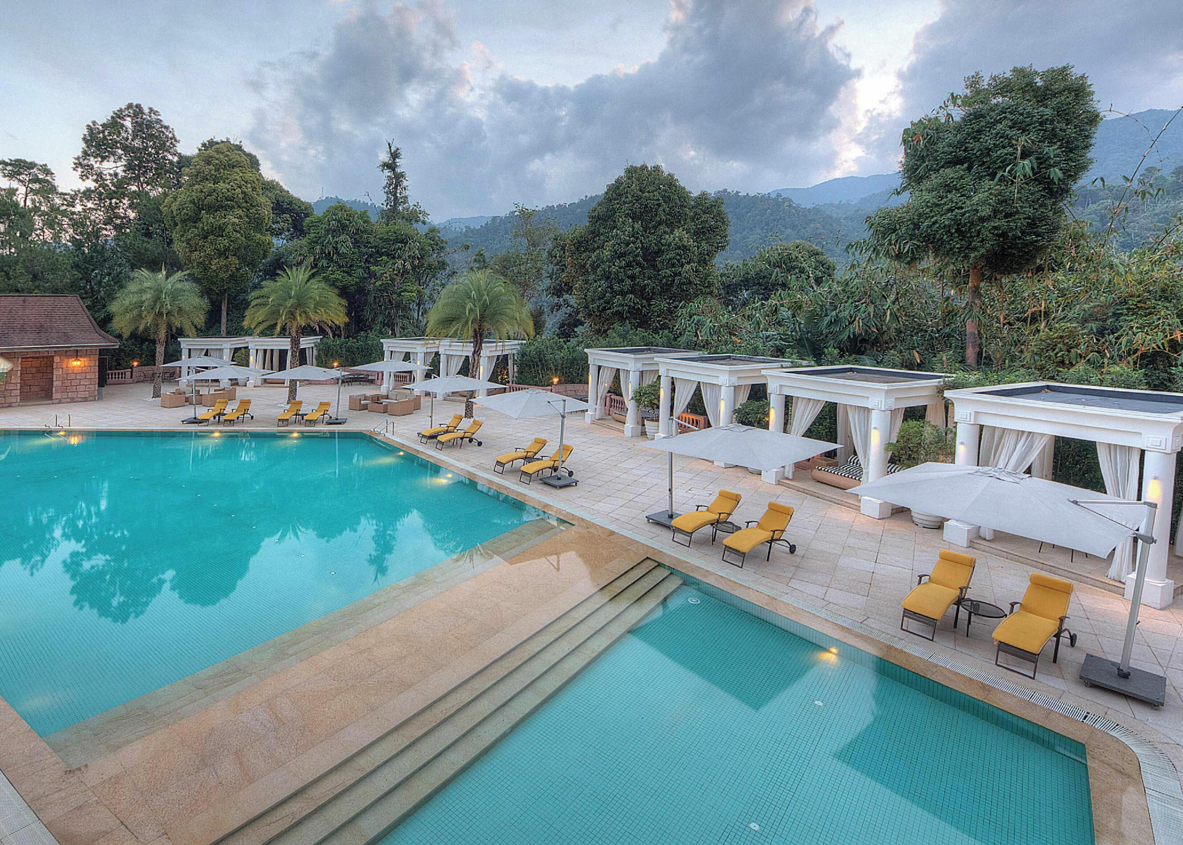 Outdoor pool, open 7:30 AM to 9:00 PM, pool umbrellas, pool loungers