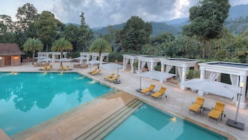 Outdoor pool, open 7:30 AM to 9:00 PM, pool umbrellas, pool loungers