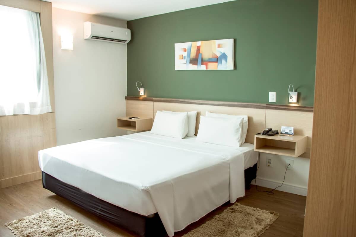 Pillow-top beds, minibar, in-room safe, laptop workspace