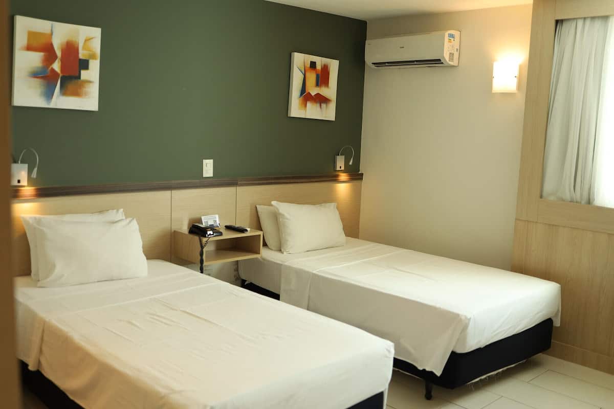 Pillow-top beds, minibar, in-room safe, laptop workspace