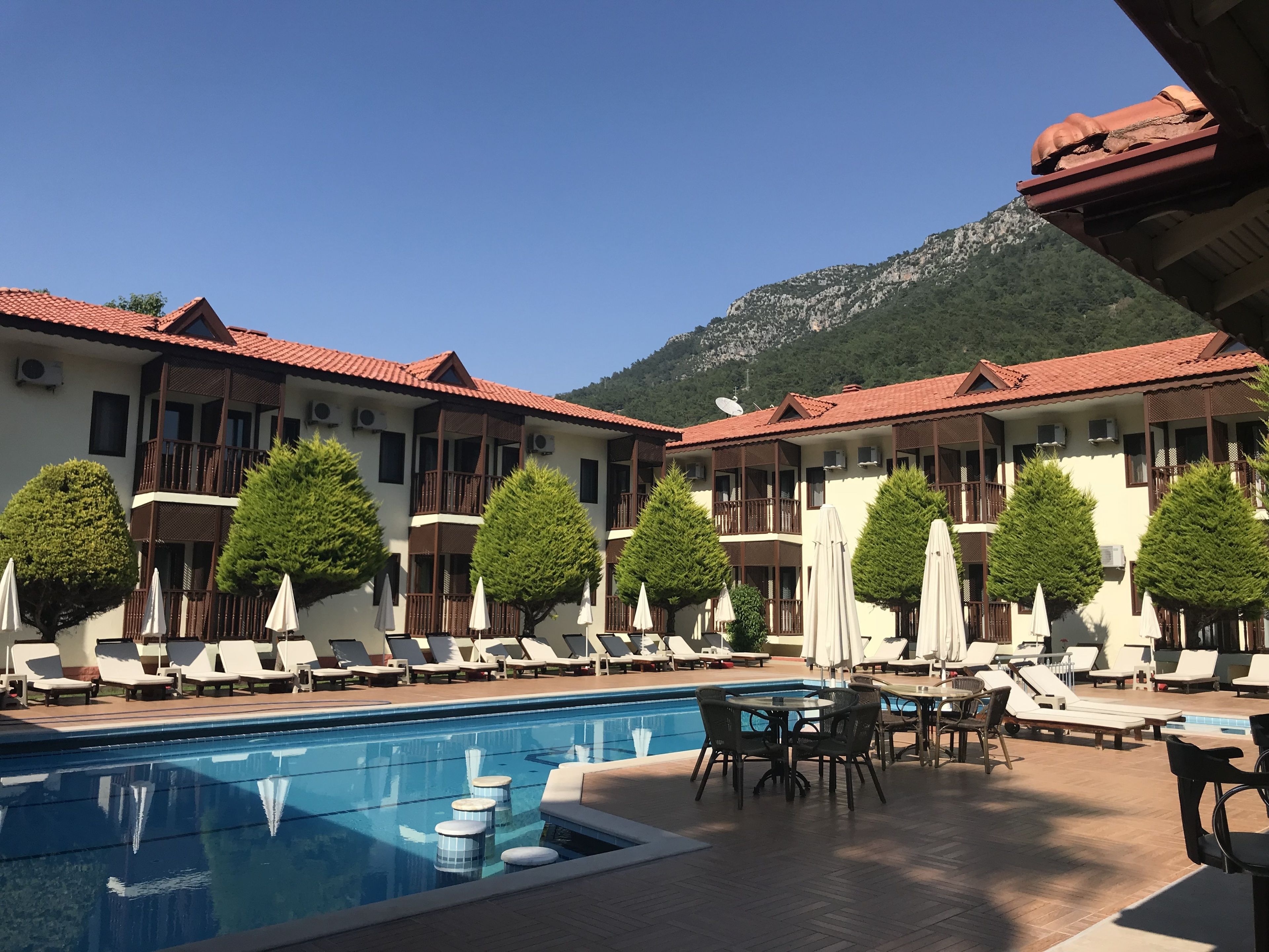 Outdoor pool, pool umbrellas, pool loungers