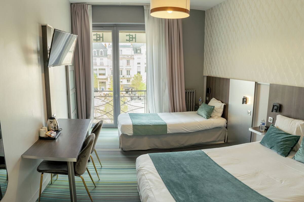 family triple room | premium bedding, desk, blackout curtains, soundproofing