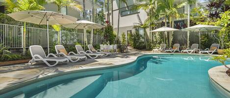 Outdoor pool, pool umbrellas, pool loungers