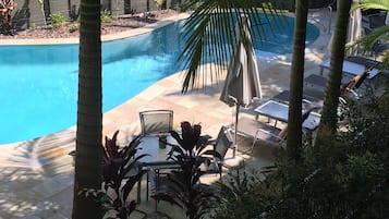 Outdoor pool, pool umbrellas, sun loungers