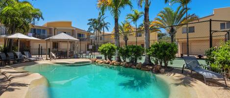 Outdoor pool, a heated pool, pool umbrellas, sun loungers