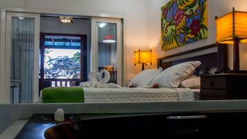 Suíte, terraço, de frente para o mar | Roupas de cama premium, frigobar, cofres nos quartos, Wi-Fi de cortesia