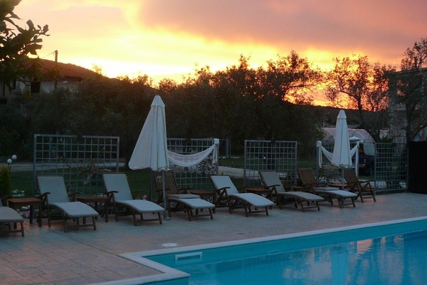 Seasonal outdoor pool, open 10 AM to 8 PM, pool umbrellas