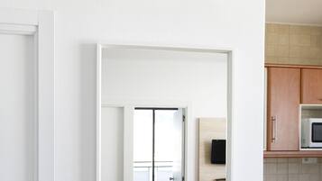Standard Apartment, 2 Bedrooms | Living room | 32-inch LED TV with satellite channels