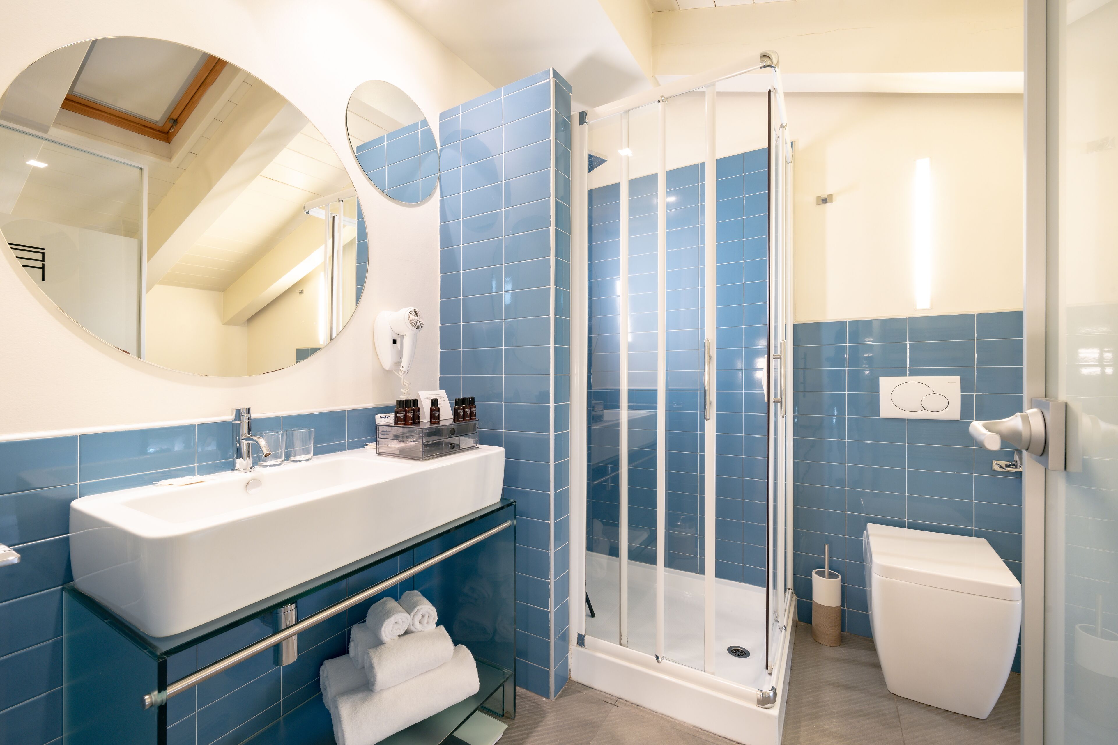 suite | bathroom | rainfall showerhead, free toiletries, hair dryer, bathrobes