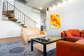 Suite, 1 Schlafzimmer | Wohnbereich