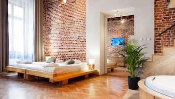 Luxe suite, 1 slaapkamer, bad | Een kluis op de kamer, individueel gedecoreerd, individueel gemeubileerd