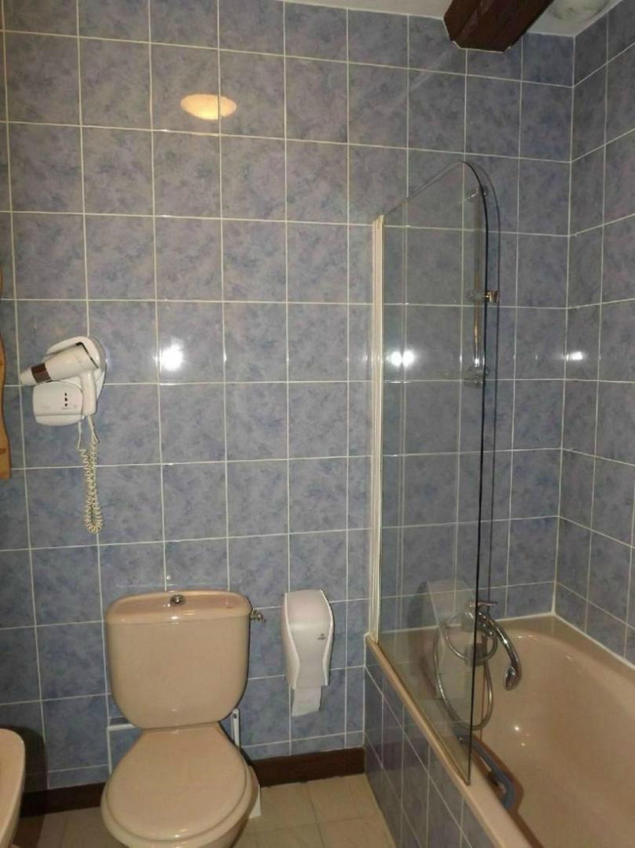 family room | bathroom | rainfall showerhead, hair dryer, towels