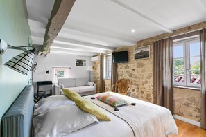 Habitación cuádruple familiar | Ropa de cama de alta calidad y sistema de insonorización