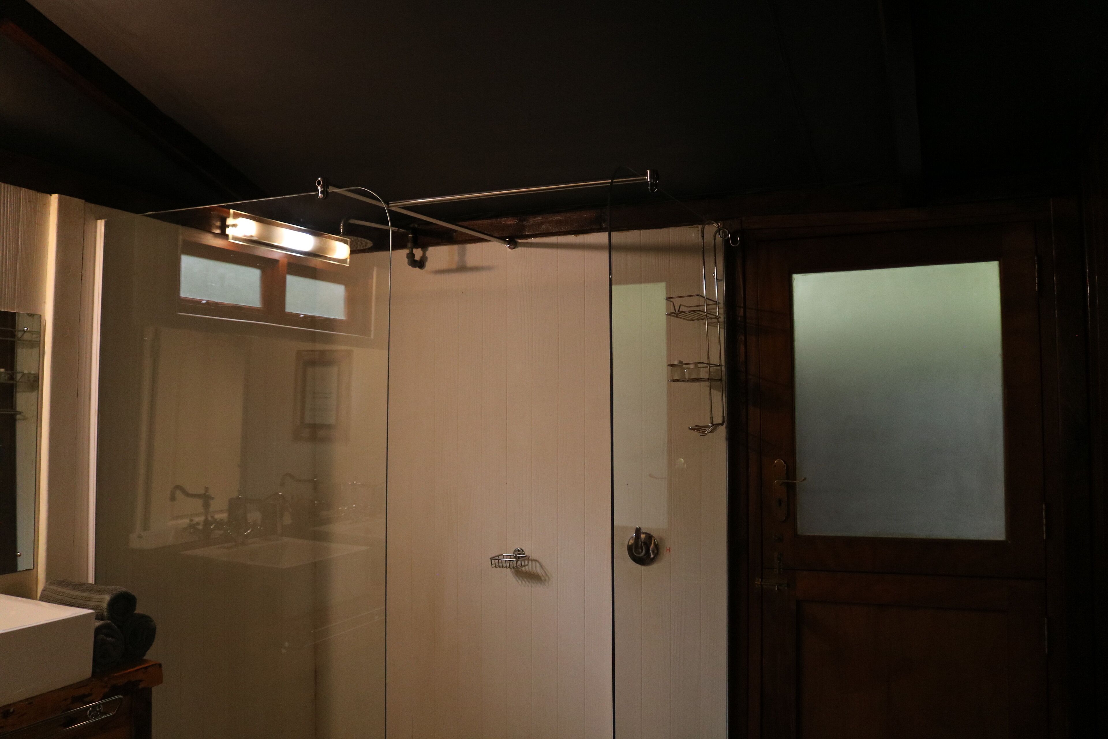 Separate tub and shower, rainfall showerhead, free toiletries
