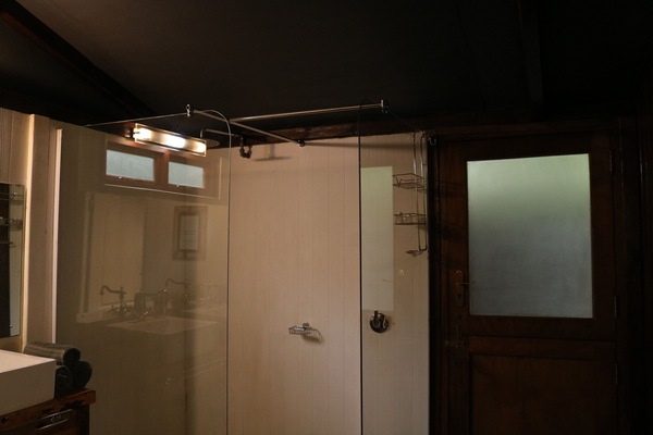 Separate tub and shower, rainfall showerhead, free toiletries