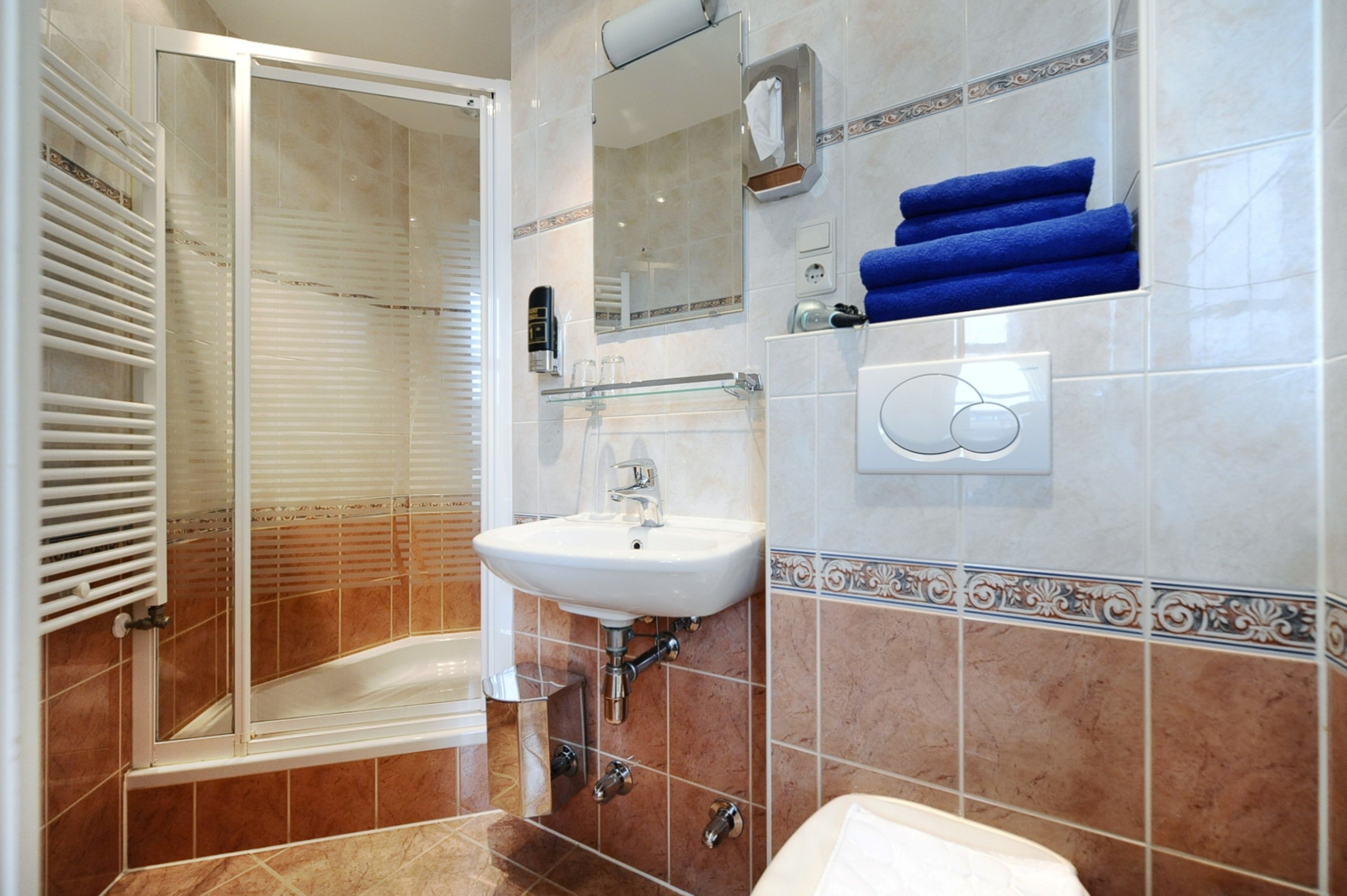 twin room | bathroom | free toiletries, hair dryer, towels