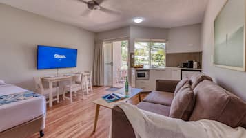 55-inch flat-screen TV with digital channels, TV, Netflix