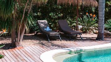 Seasonal outdoor pool, pool umbrellas, pool loungers