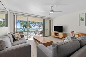 Apartment, 2 Bedrooms, Ground Floor (Direct Beach Access) | Living area | Plasma TV, DVD player