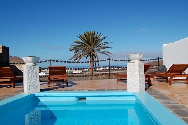 Outdoor pool, sun loungers