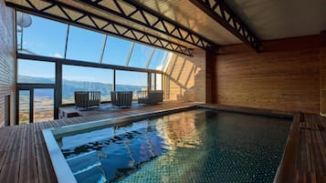 Indoor pool, open 8:30 AM to 8:30 PM, pool loungers