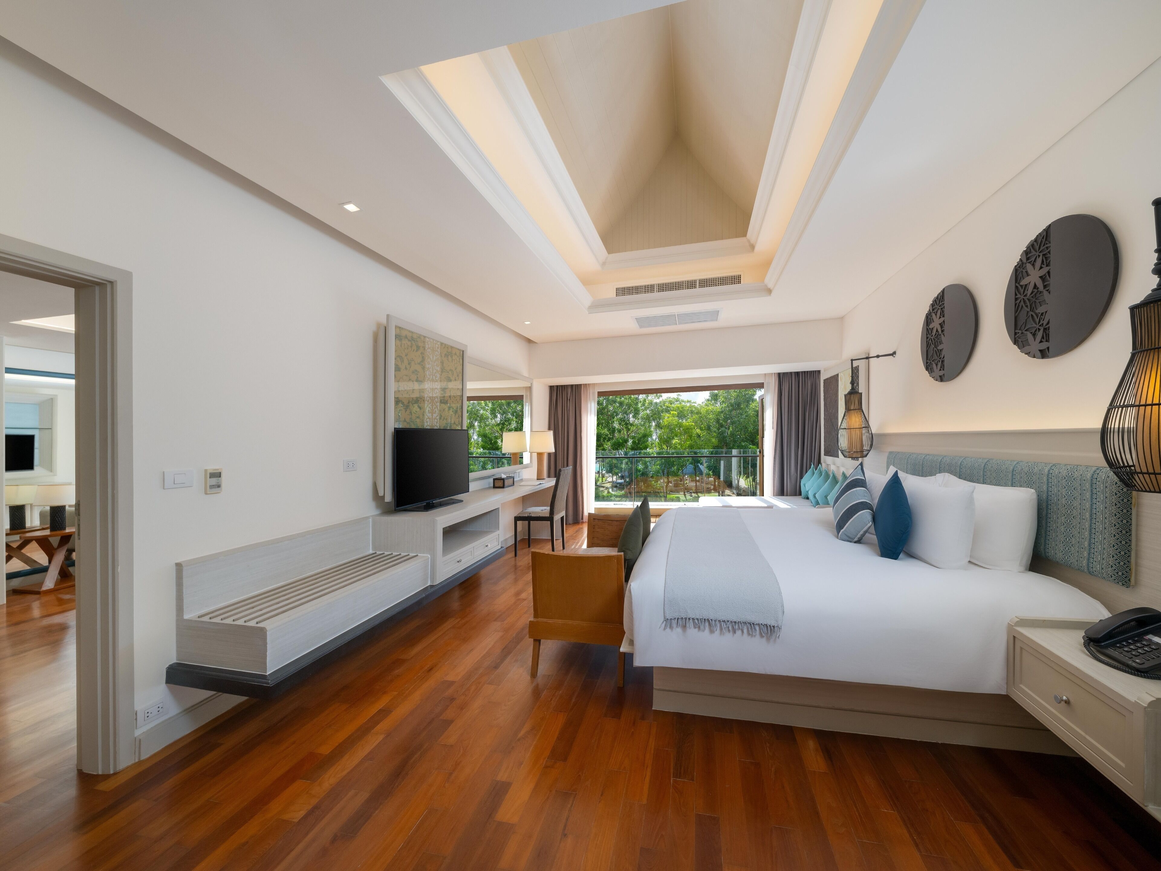 deluxe suite | in-room safe, desk, blackout curtains, soundproofing