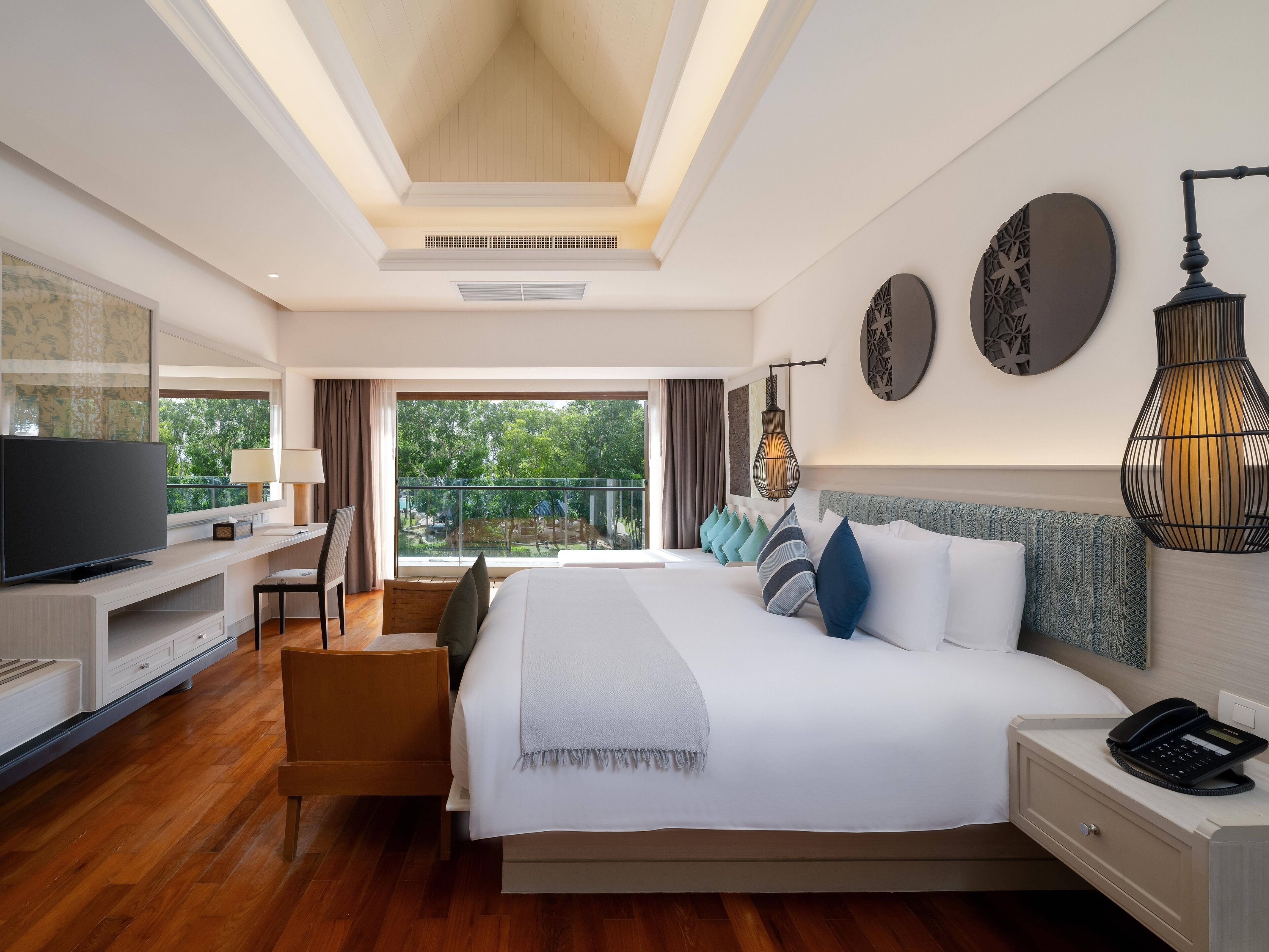 deluxe suite | in-room safe, desk, blackout curtains, soundproofing