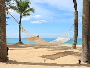 On the beach, sun-loungers, beach umbrellas, beach towels