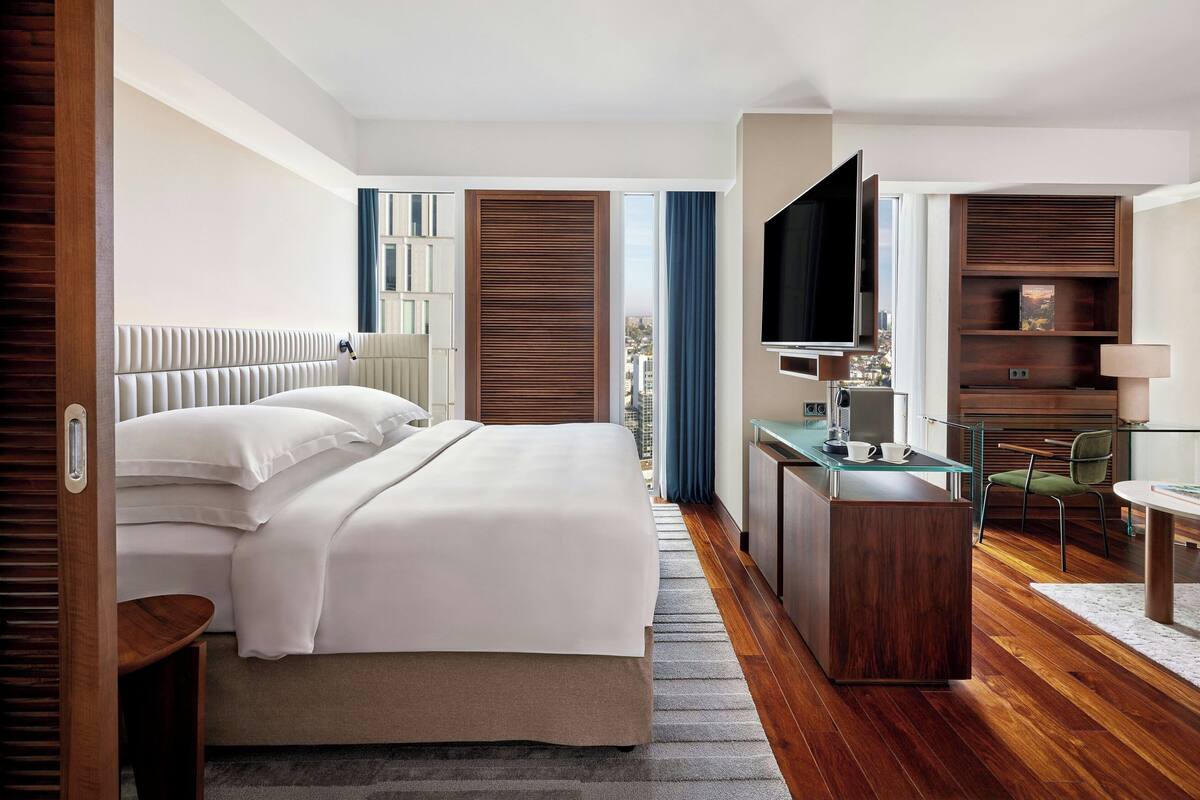 Premium bedding, down duvets, minibar, in-room safe
