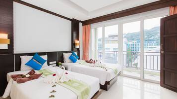 Deluxe Double or Twin Room | Minibar, in-room safe, desk, blackout drapes