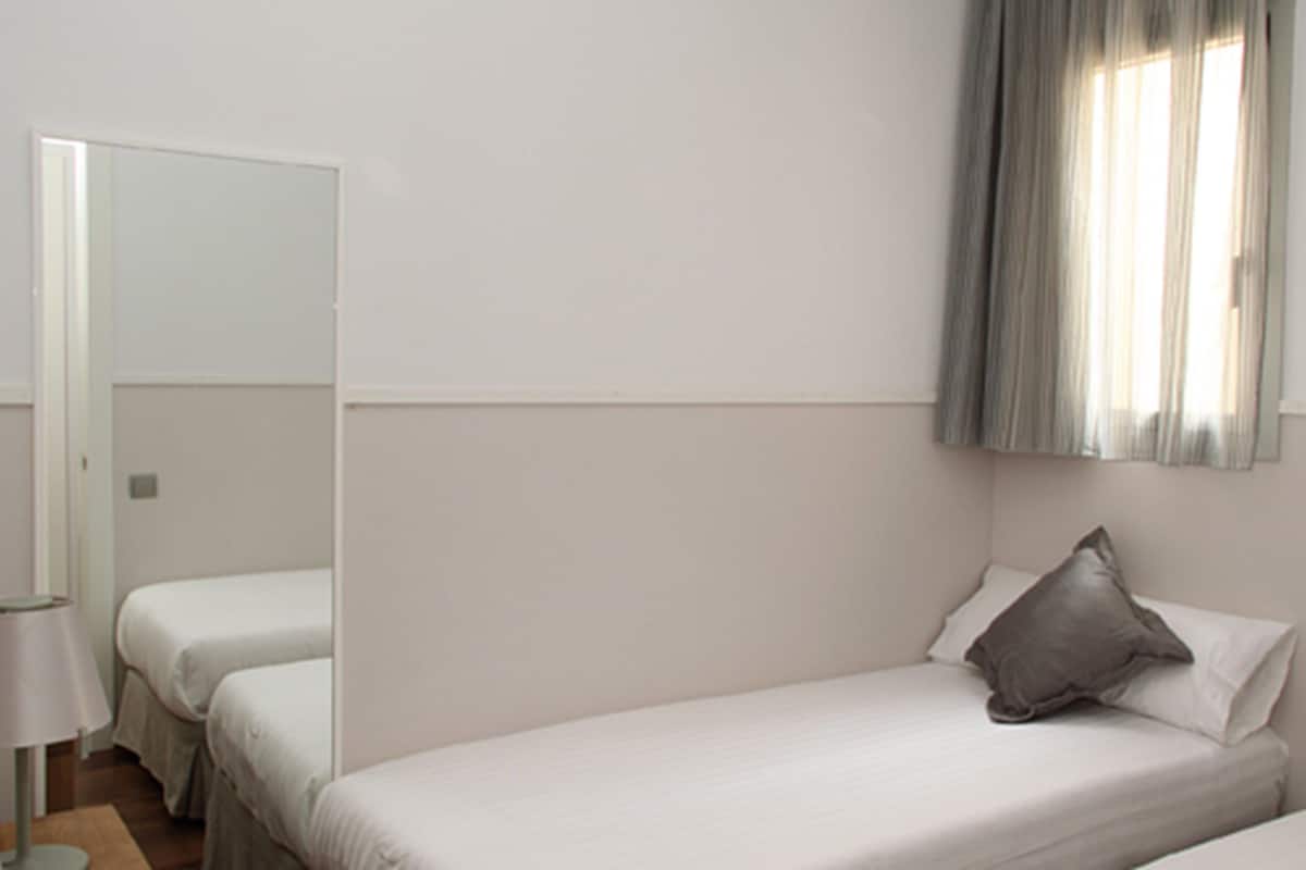 In-room safe, laptop workspace, blackout drapes, soundproofing