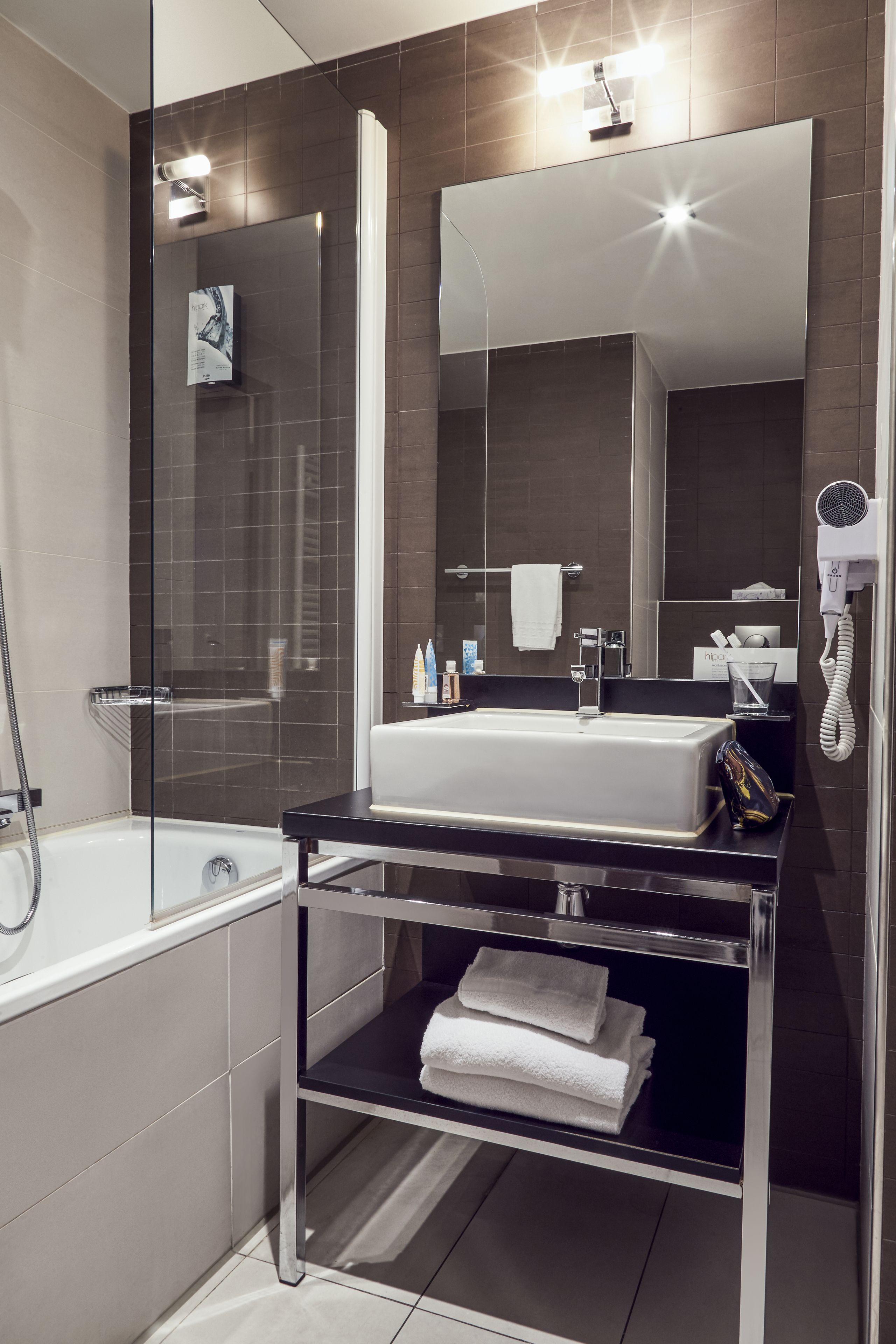Eco-friendly toiletries, hair dryer, towels