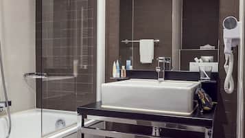 Eco-friendly toiletries, hair dryer, towels