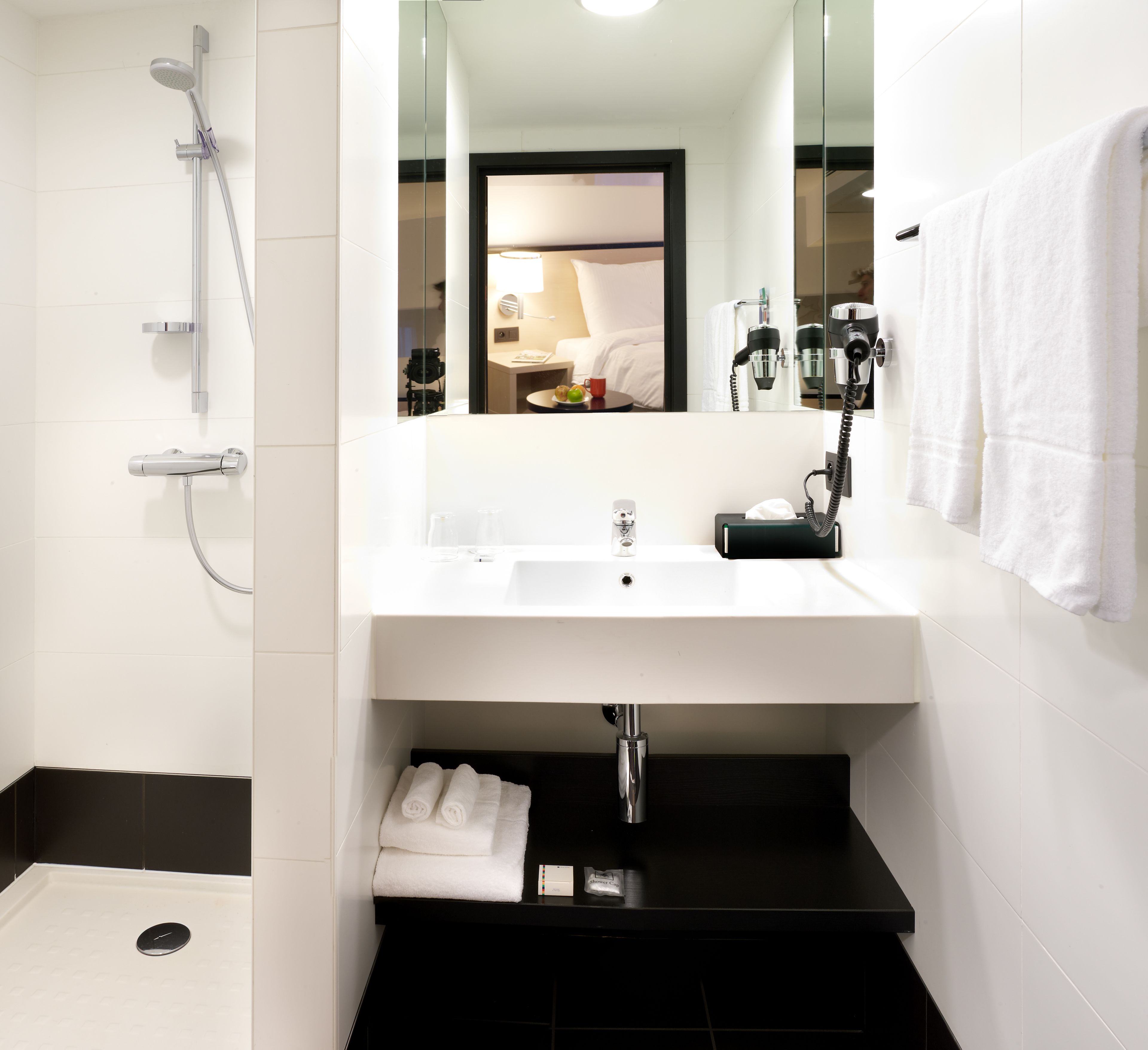 shower, eco-friendly toiletries, hair dryer, towels