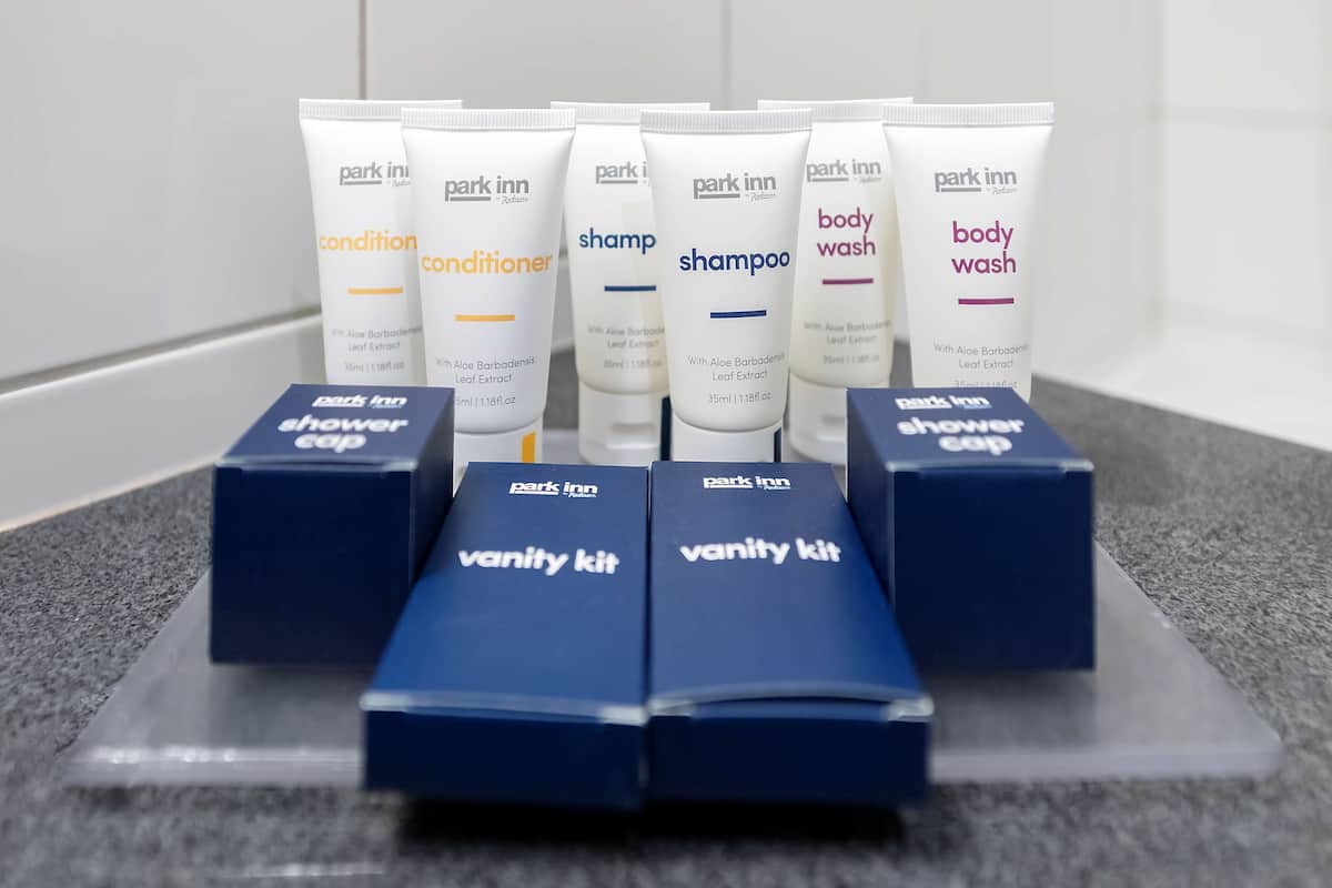 shower, eco-friendly toiletries, hair dryer, towels