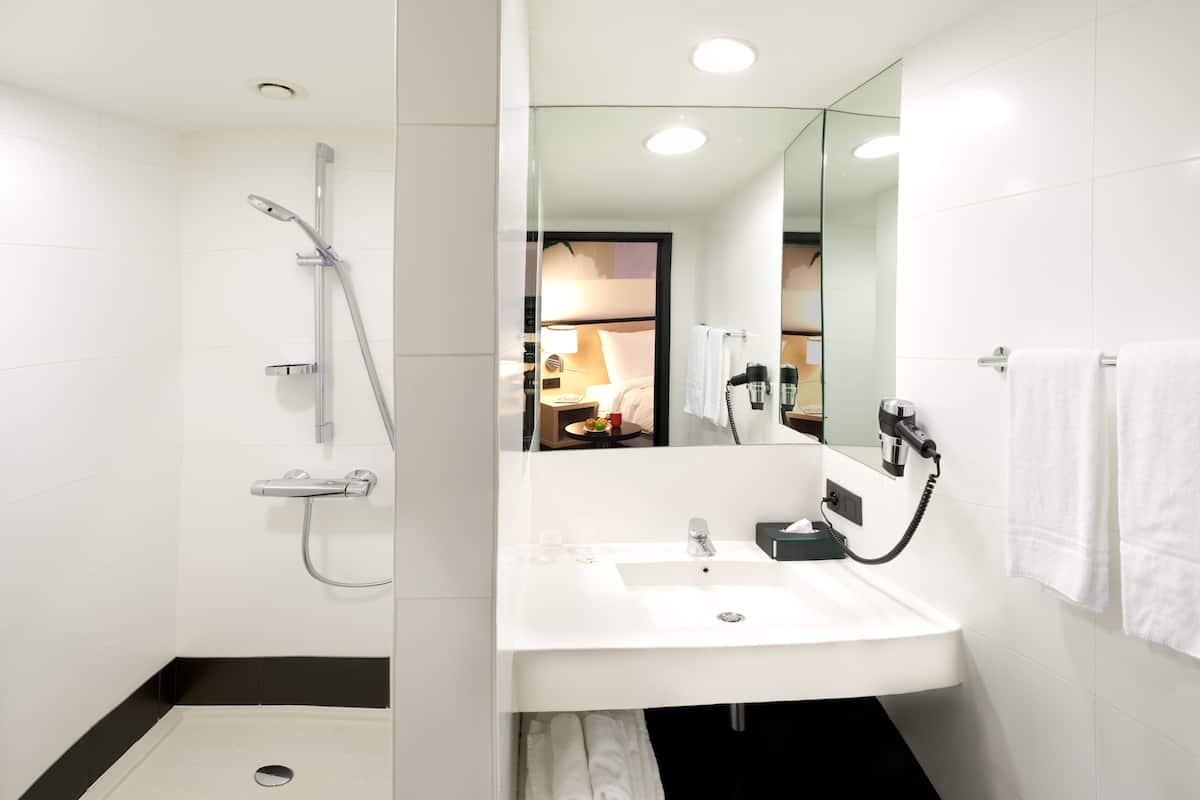 shower, eco-friendly toiletries, hair dryer, towels