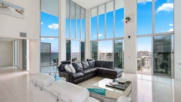 Penthouse, 4 Bedrooms | Living area | LED TV