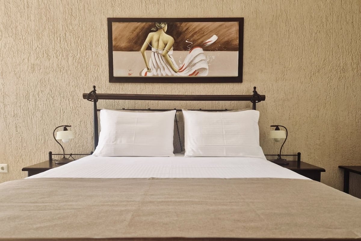 Pillowtop beds, blackout drapes, iron/ironing board, free WiFi