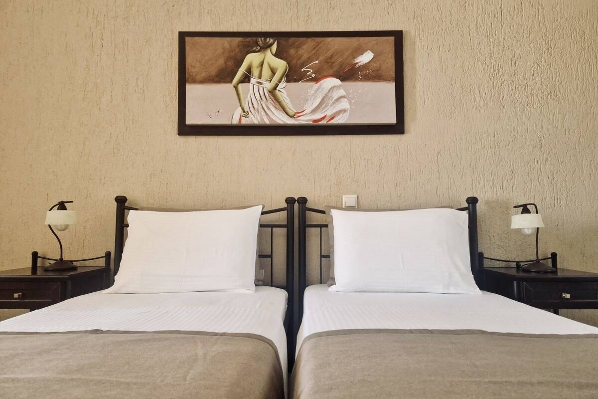 pillow-top beds, blackout curtains, iron/ironing board, free wifi