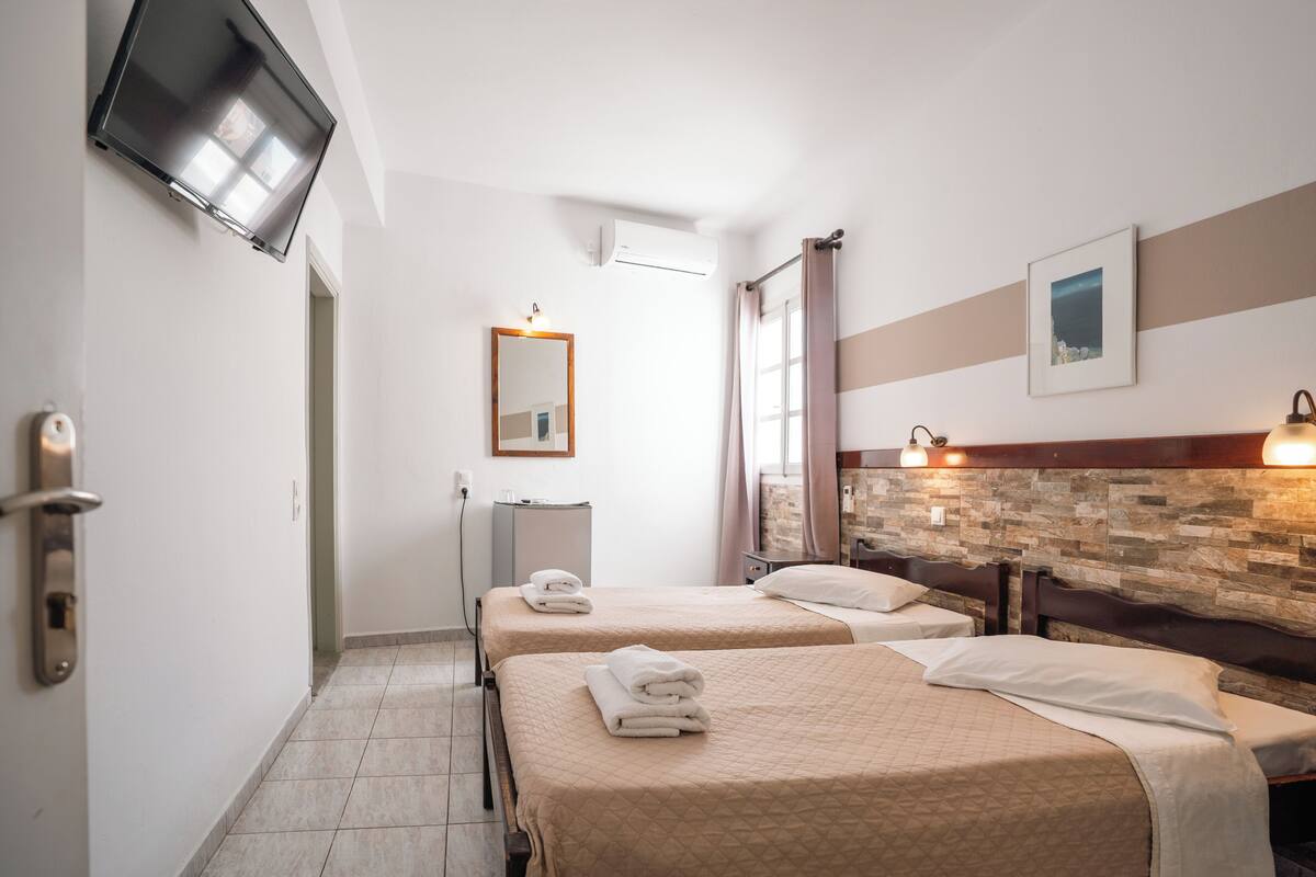 Kamar Twin Basic | Brankas, Wi-Fi gratis, dan seprai linen