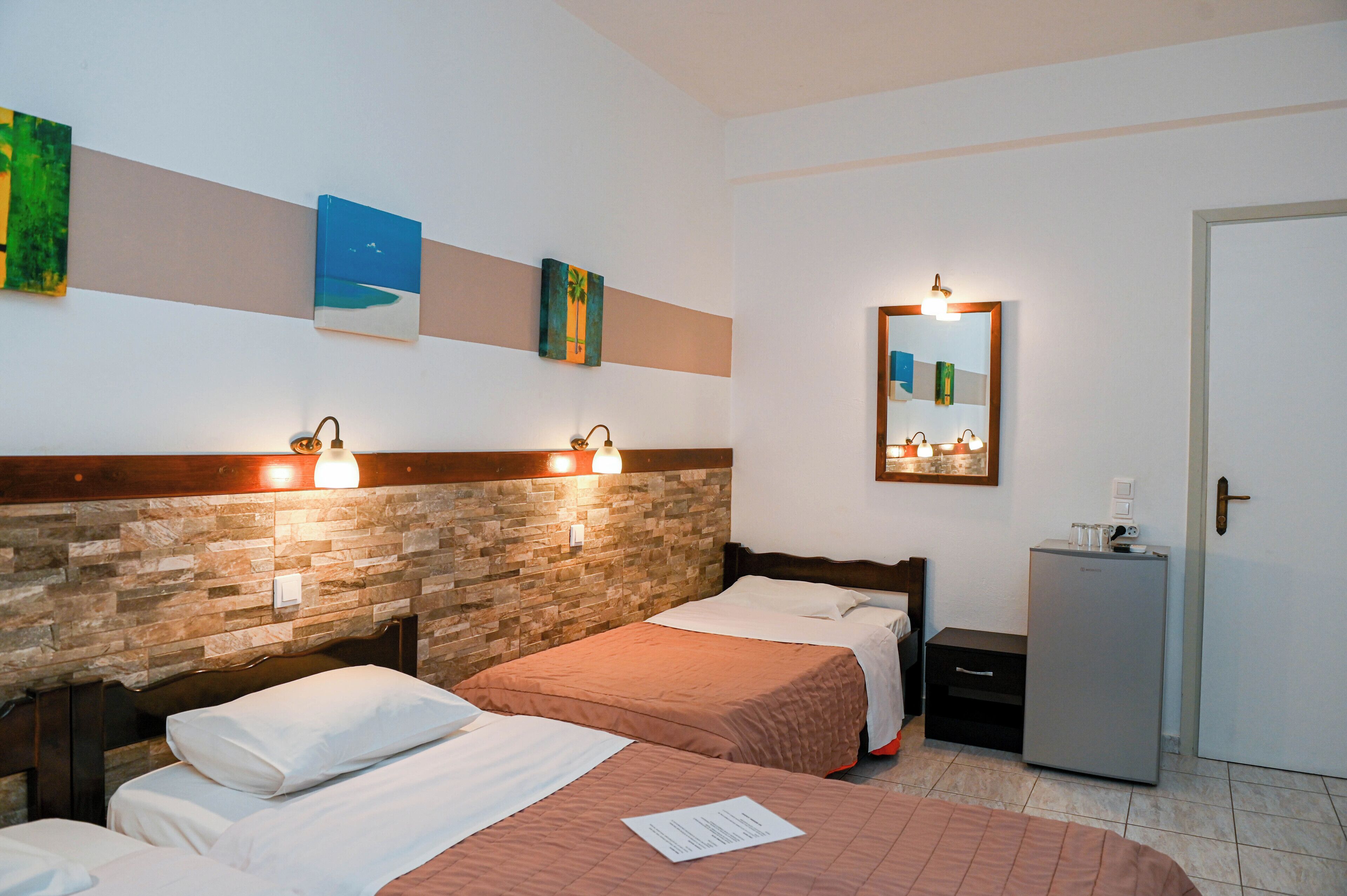 basic triple room | in-room safe, free wifi, bed sheets