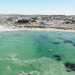 Beach nearby, white sand, beach towels