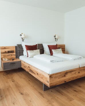 Sistema de insonorización y tabla de planchar con plancha 