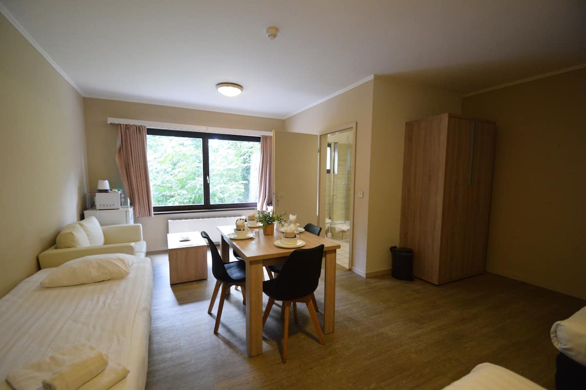 Basic Quadruple Room | Individually decorated, individually furnished, desk, laptop workspace