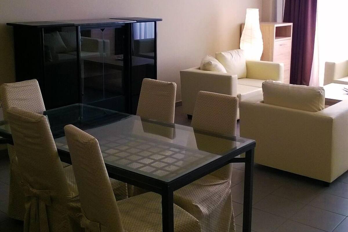 Apartment, 2 Twin Beds | Living area | Flat-screen TV