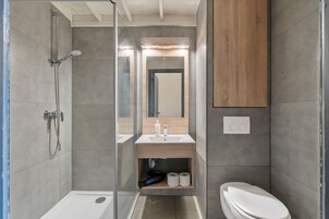 Family Apartment Semi Duplex | Bathroom | Shower, hair dryer, towels, toilet paper