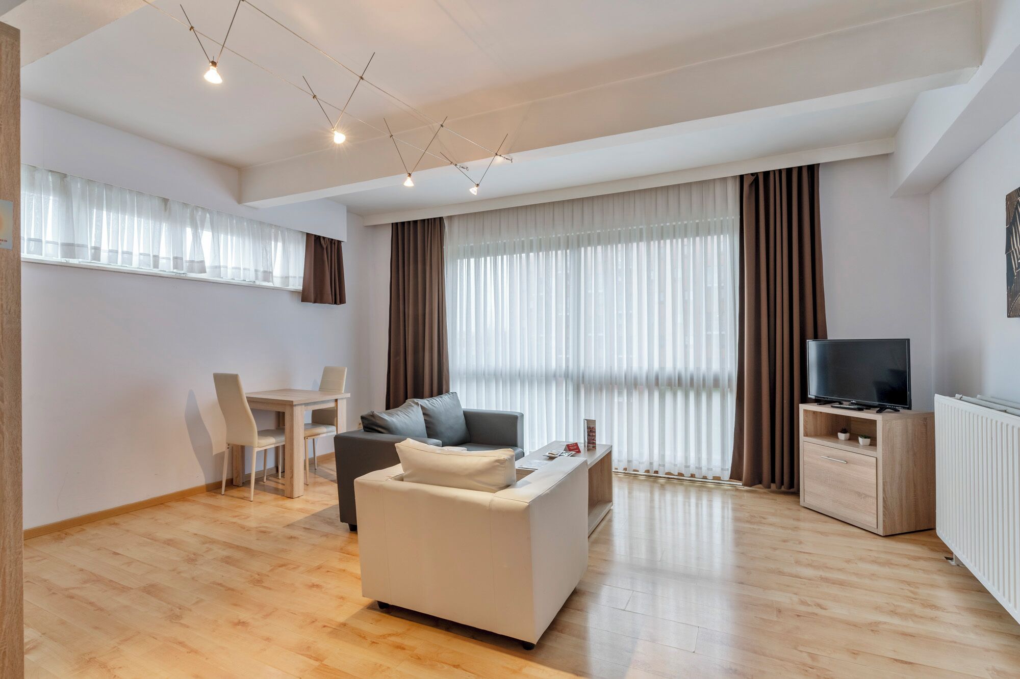 Apartment, 1 Bedroom | Living area | LCD TV