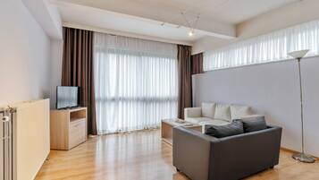 Apartment, 2 Bedrooms | Living area | LCD TV