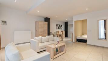 Apartment, 2 Bedrooms | Living area | LCD TV